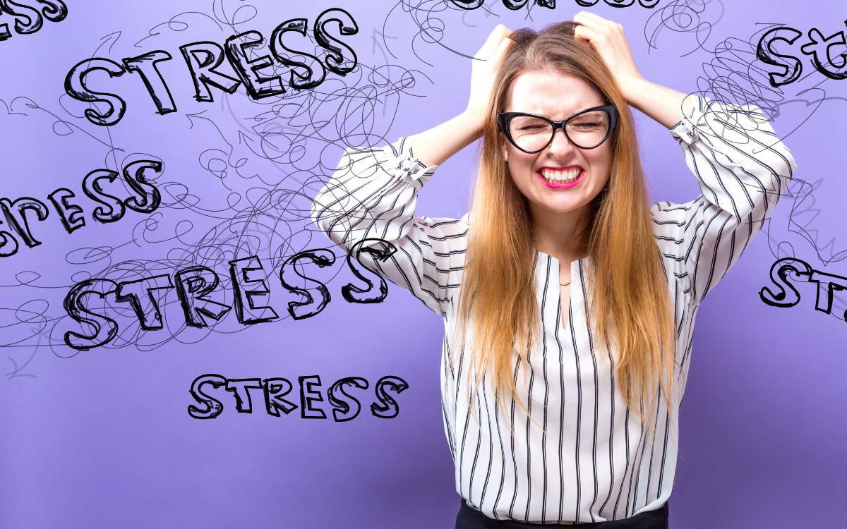 Woman holding hair stressed